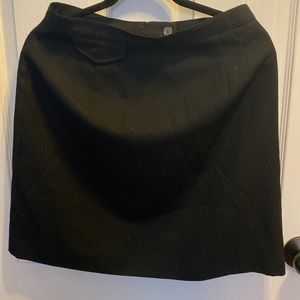 Black knee length lined wool skirt